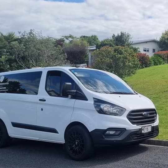 Lamb & Associates van in front of a section