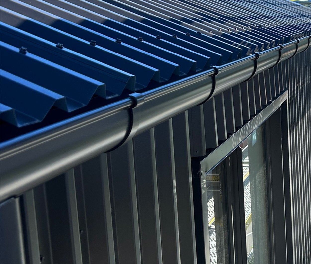 Half-round Colour Steel guttering and round downpipes