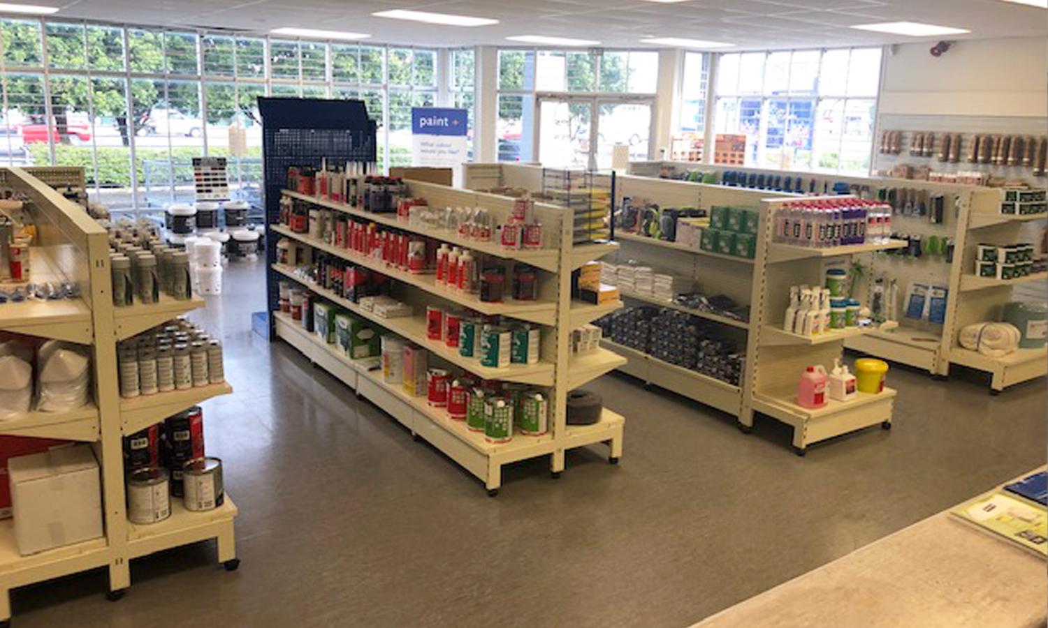 Paint+ store interior with several aisles and all their products on display