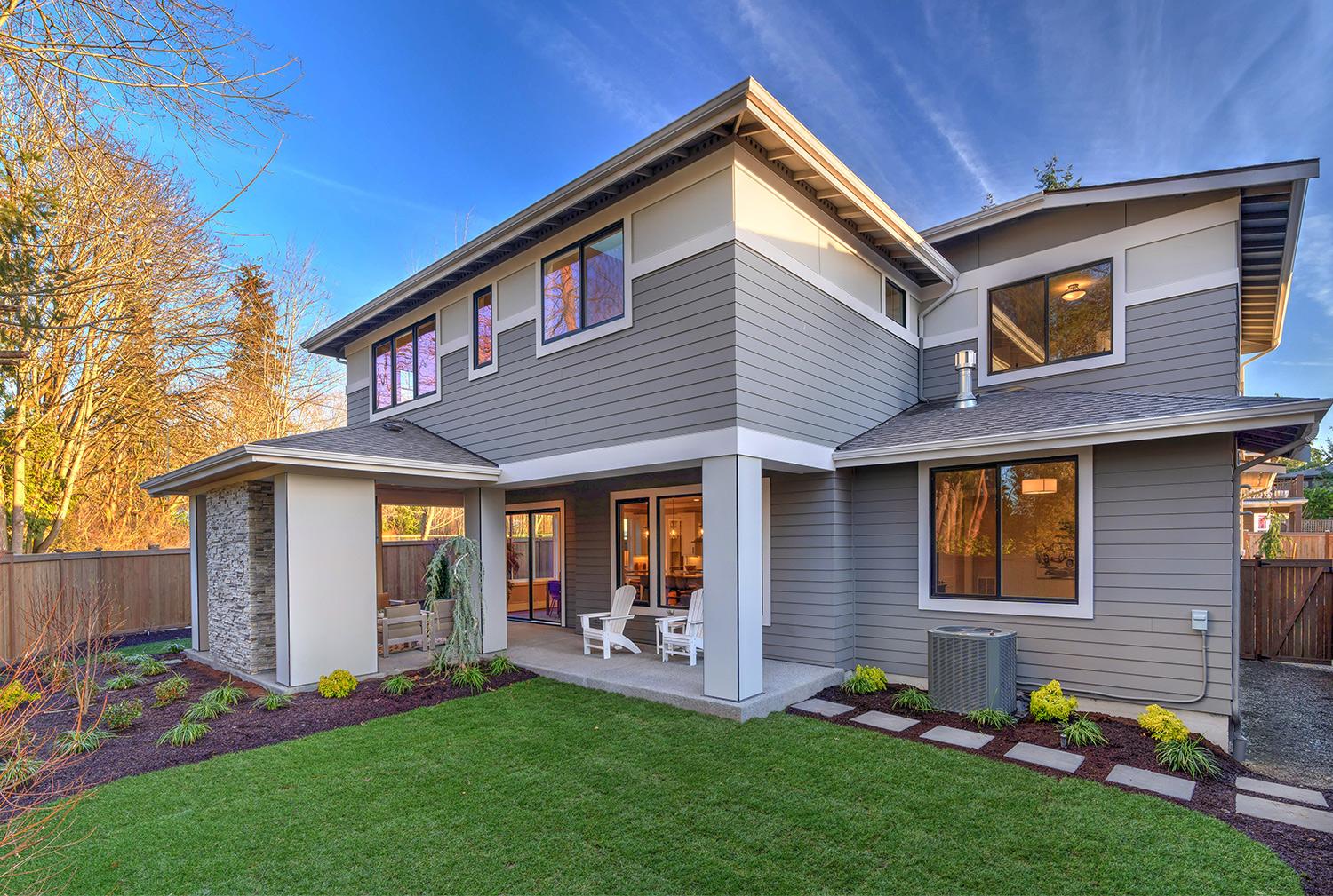 Outside view of a large two-story house with Thermally Broken Double Glazed Windows and Doors - Links to Double Glazing page