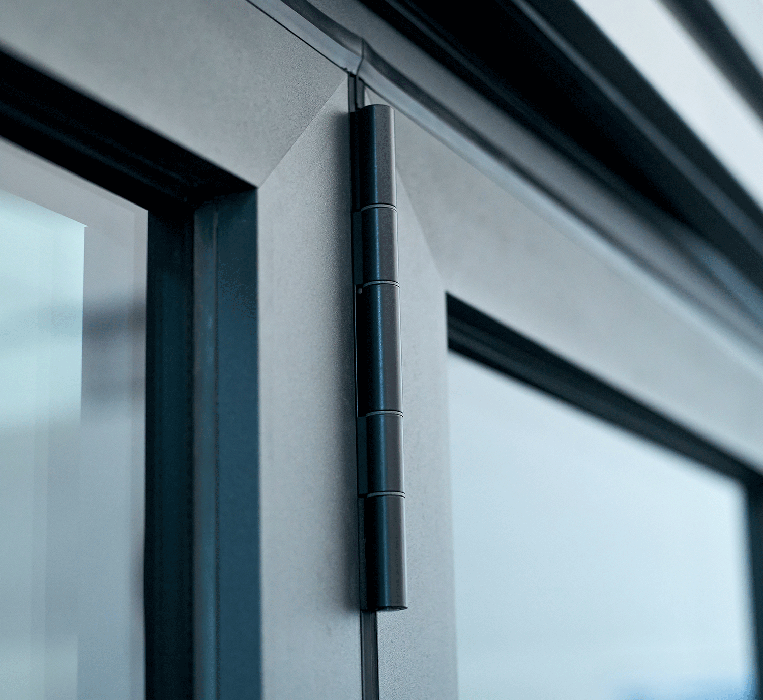 Close up of a dark grey aluminium door frame - links to aluminium colours page