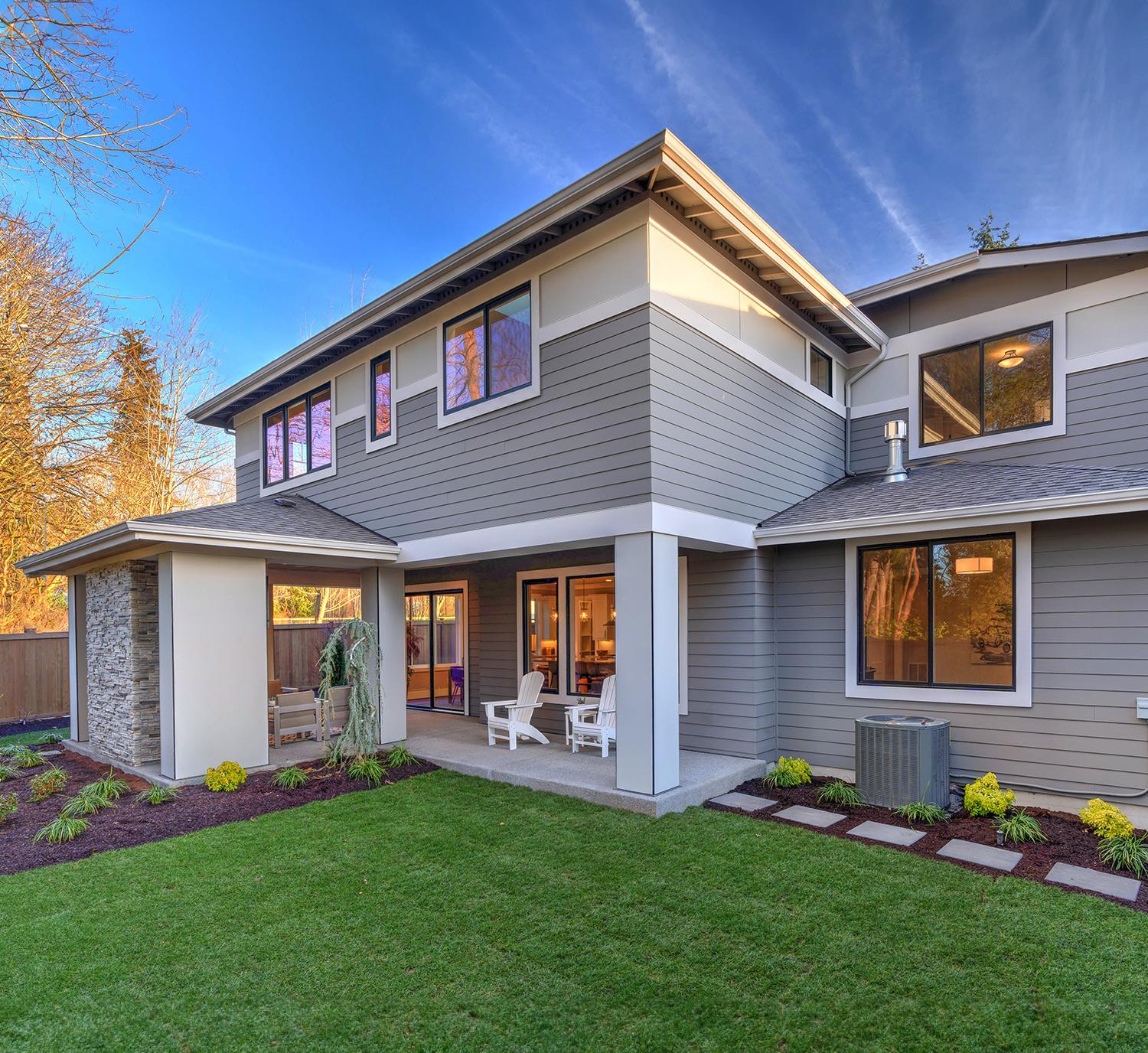 Outside view of a large two-story house with Thermally Broken Double Glazed Windows and Doors - Links to Double Glazing page