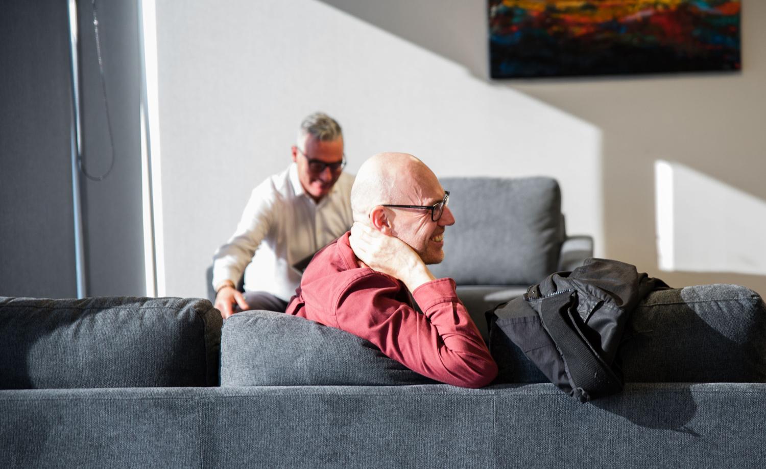 Close up of smiling Web Genius staff relaxing in the office