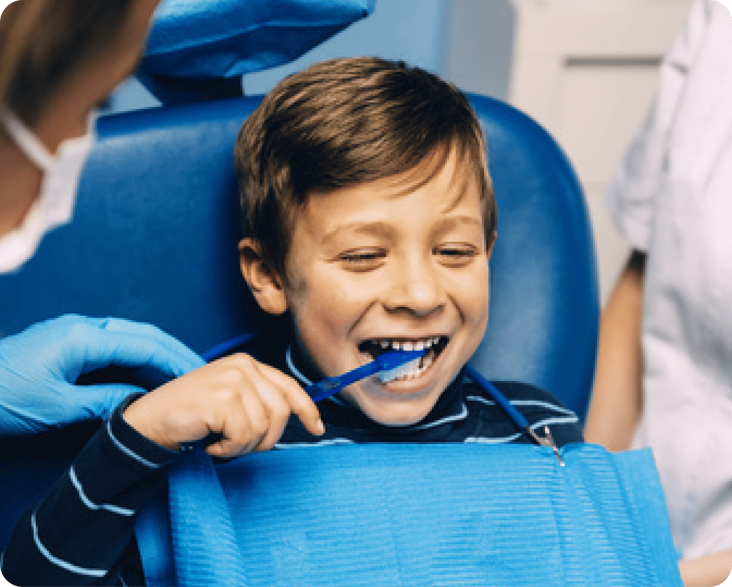 Young Boy getting brushing advice at a General Dental Checkup