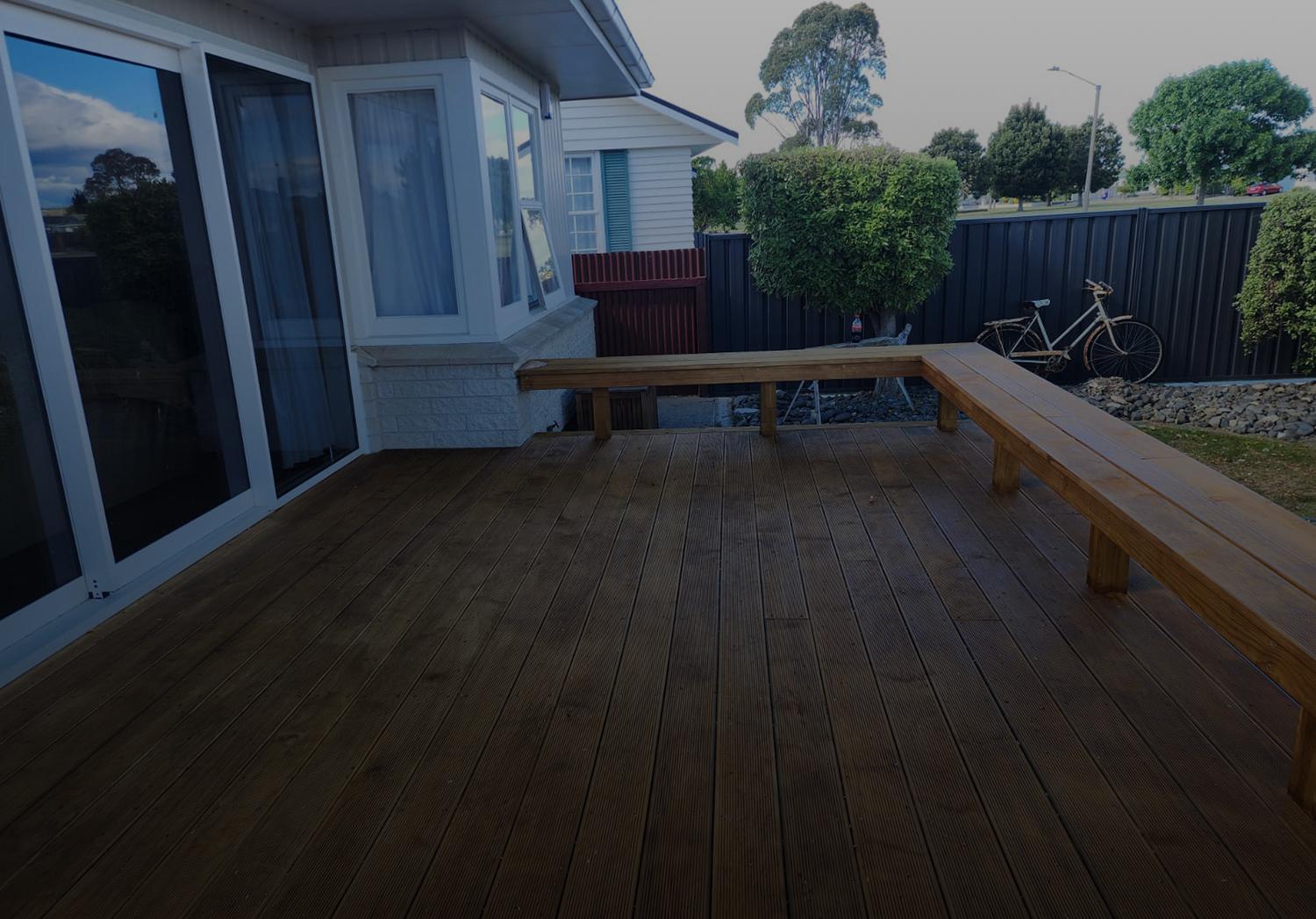 Close up shot of a builder's hands using a skill-saw tool to cut some ply-wood | links to the Carpentry page 