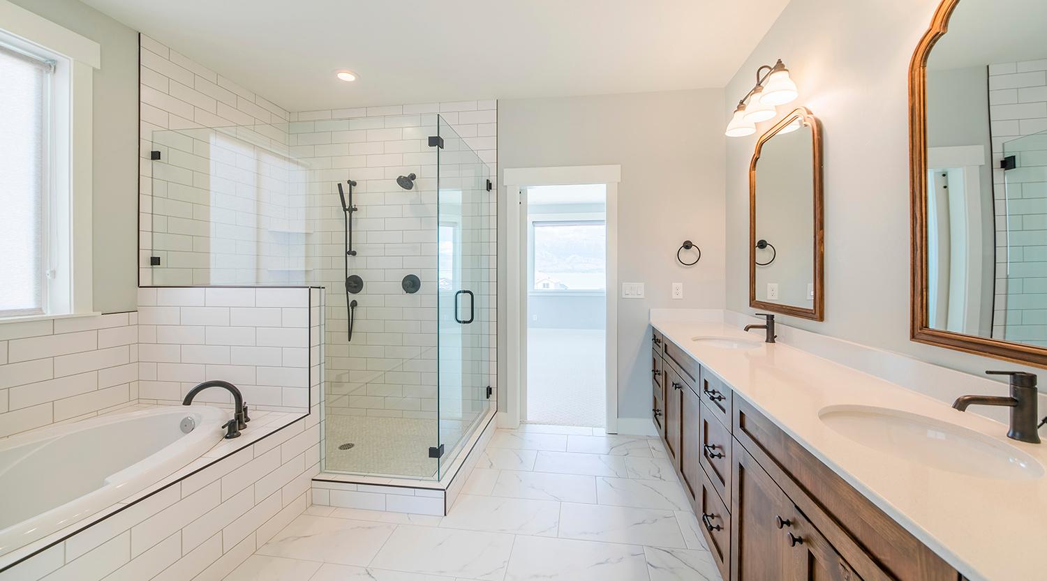 Modern Bathroom with a Frameless Glass shower and black fittings - Links to Frameless Glass Showers page