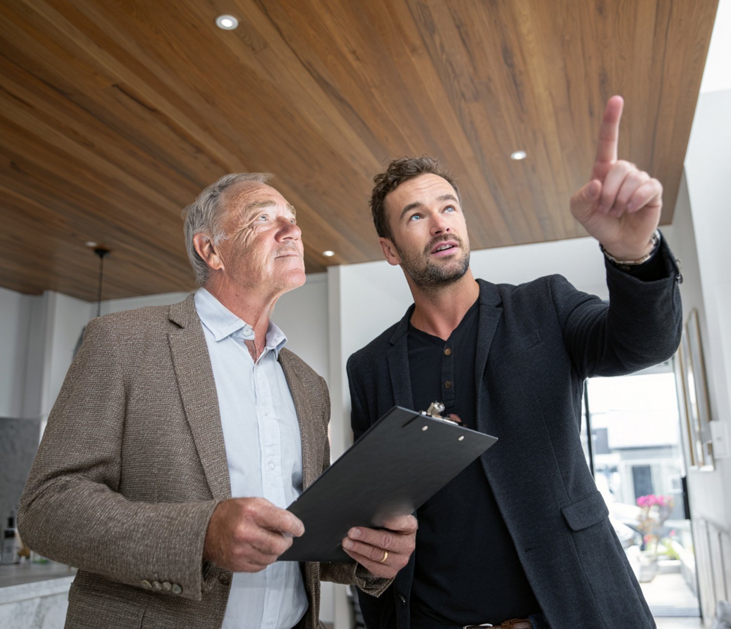 John and a client discussing alarm placement