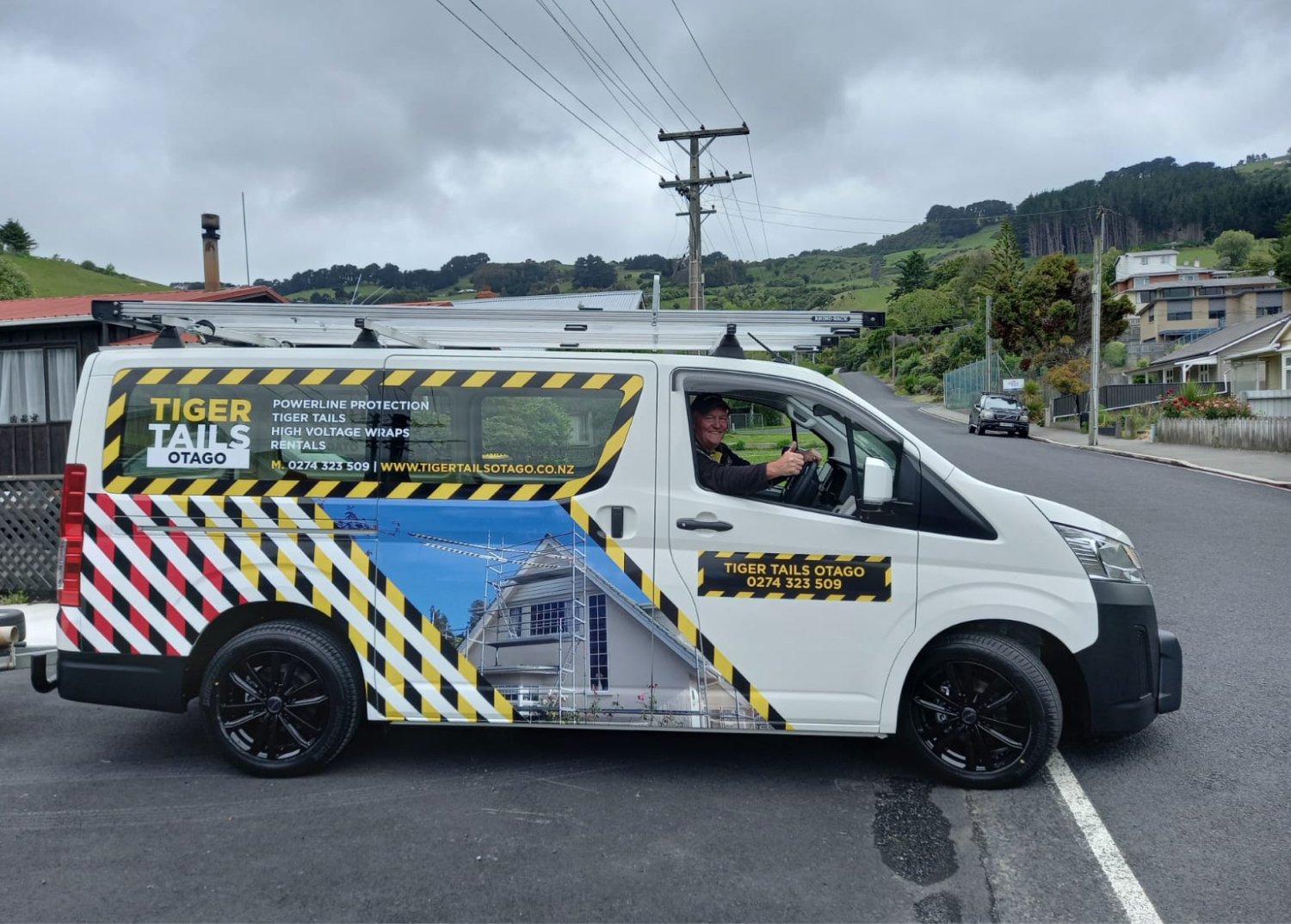 Rob in the Tiger Tails Otago van