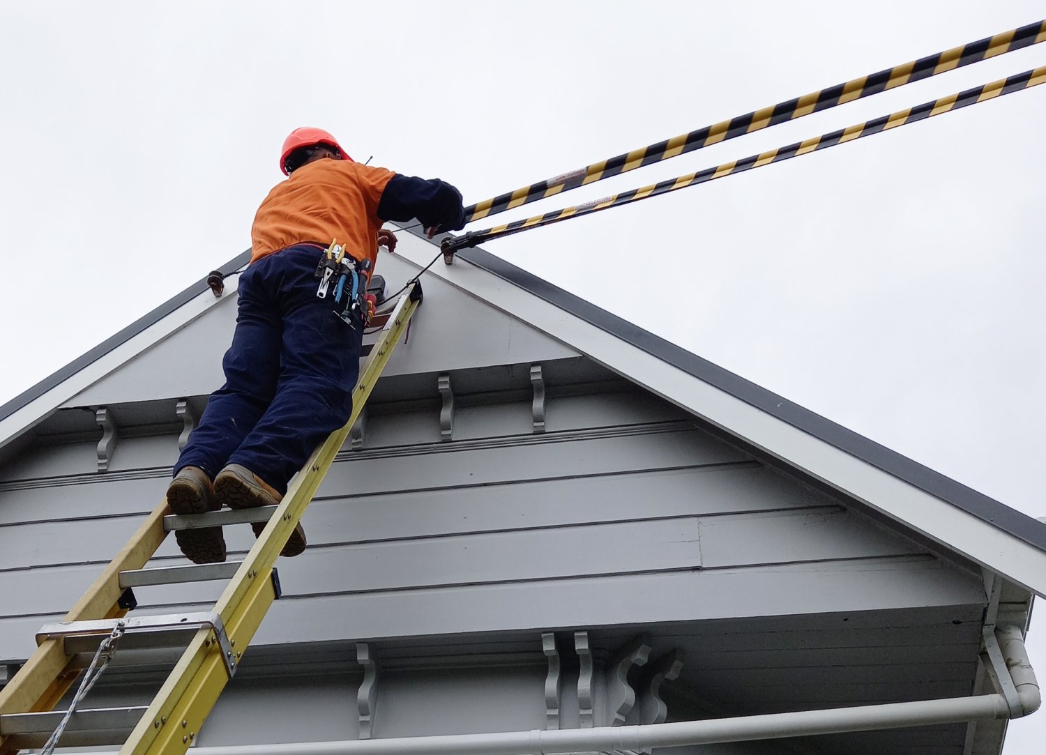 installation of Tiger Tails on a house