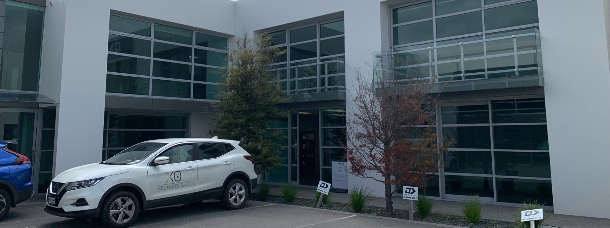 XO Recruitment branded vehicle parked in front of the XO Recruitment headquarters in Christchurch