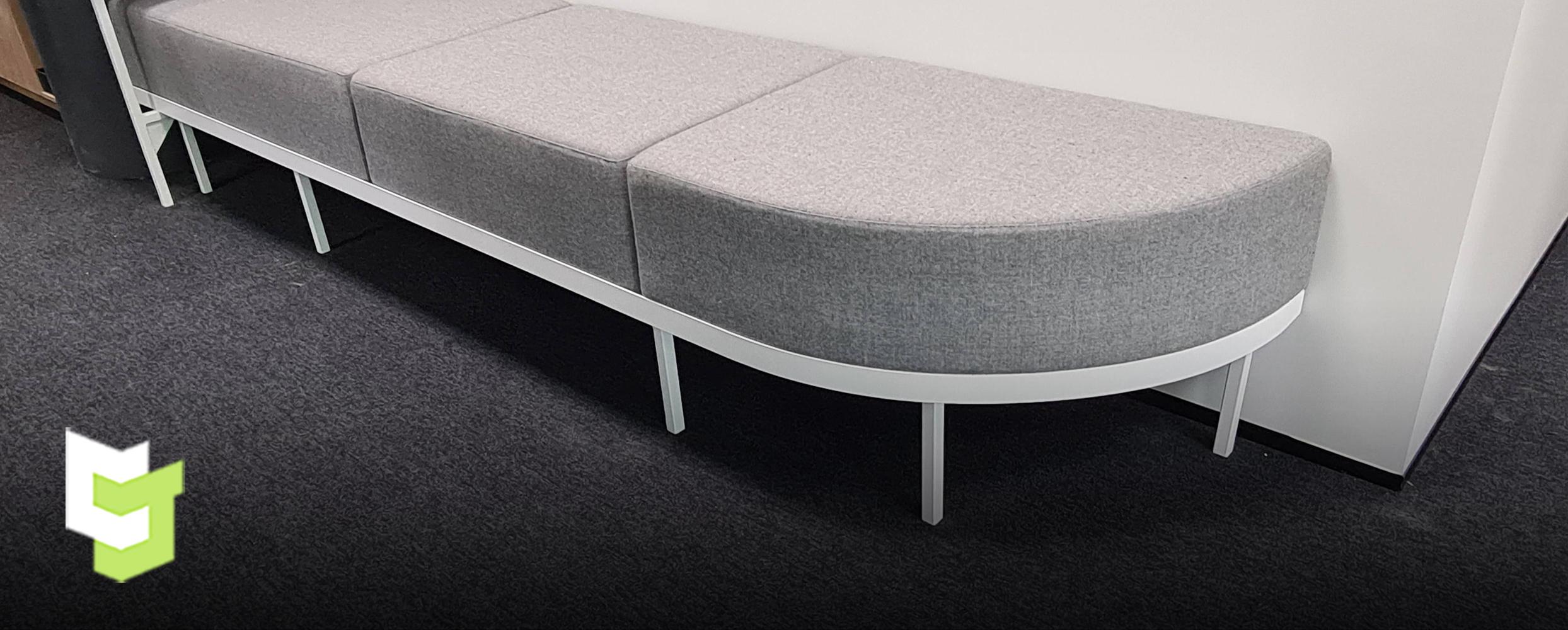 ACC Hamilton workspace with custom seating area as a part of a custom fitout by Colourform Joinery