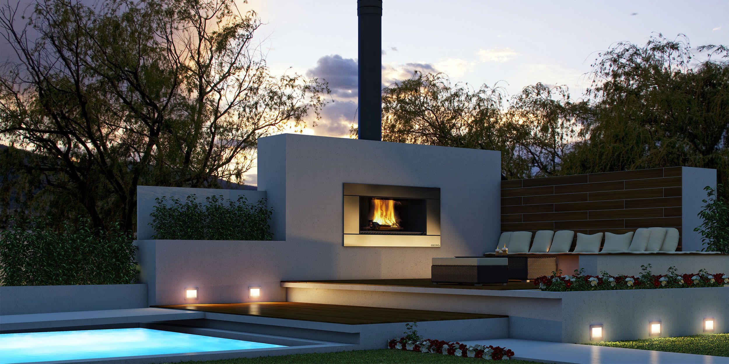 Wooden floored outdoor sitting area by the pool with a comforting outdoor fire built into a large white stone wall