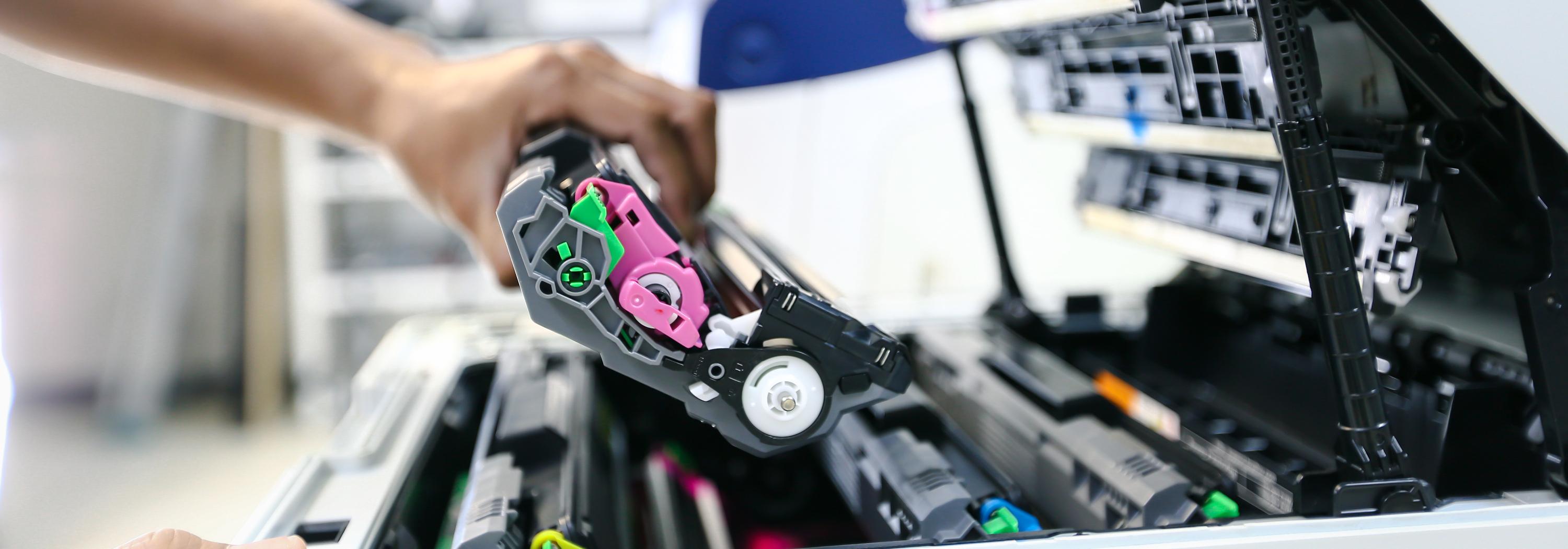 changing a printer/copier cartridge/toner