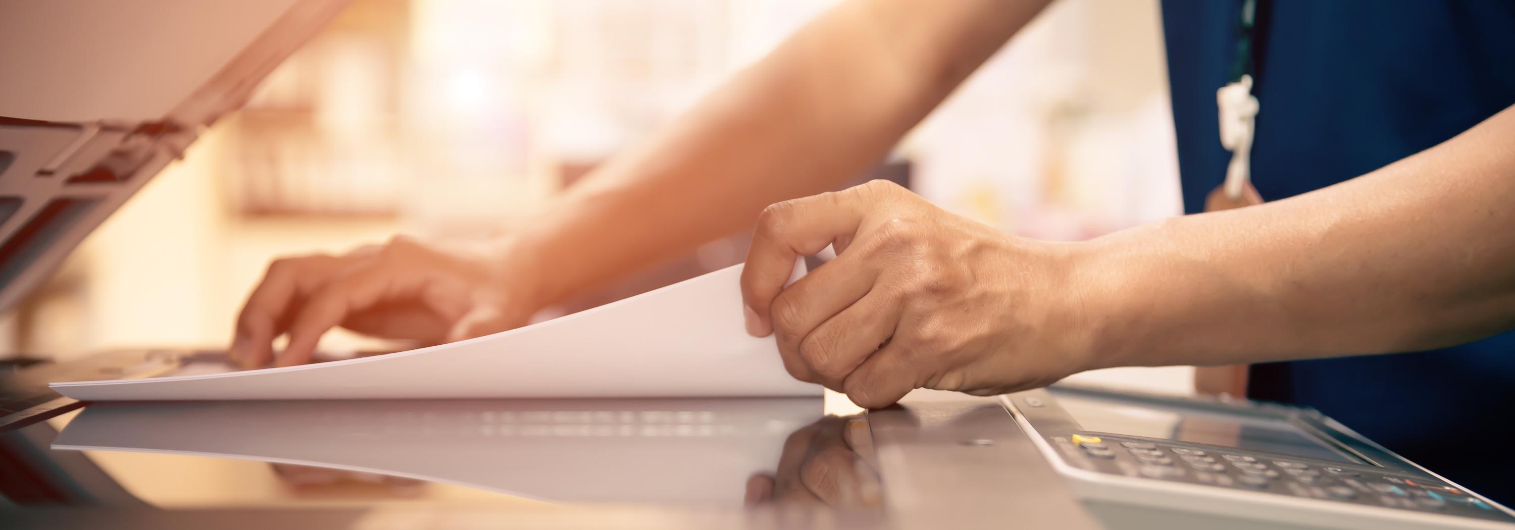 Placing paper in a copier/printer