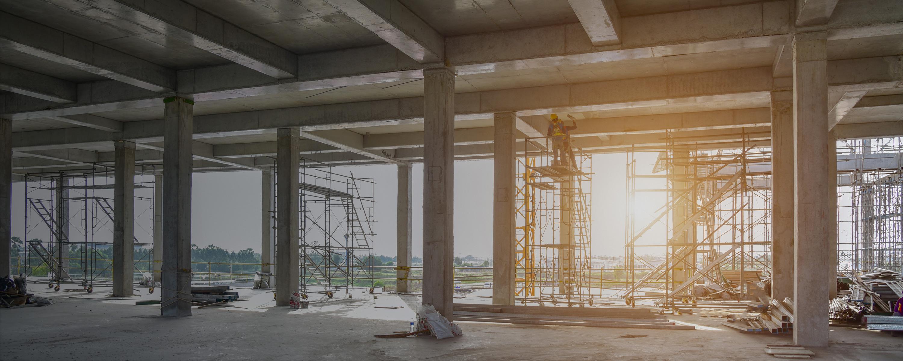 Sun shining through a concrete industrial building during construction | Concrete company Canterbury