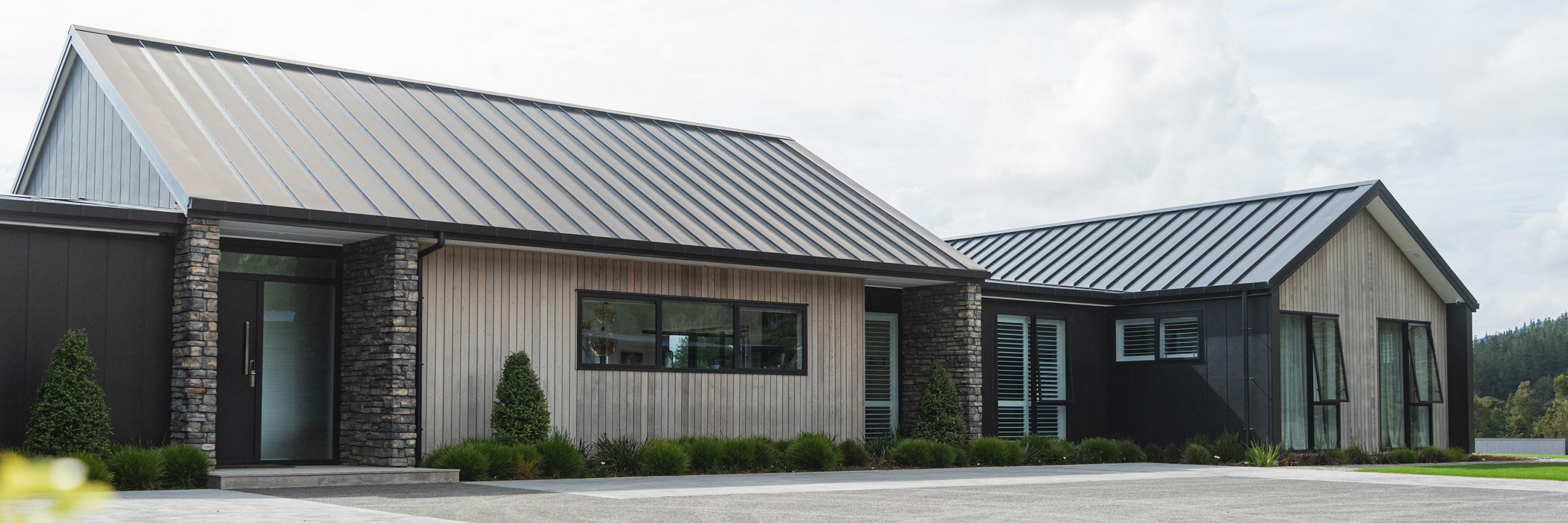 Beautiful home with box guttering and round downpipes