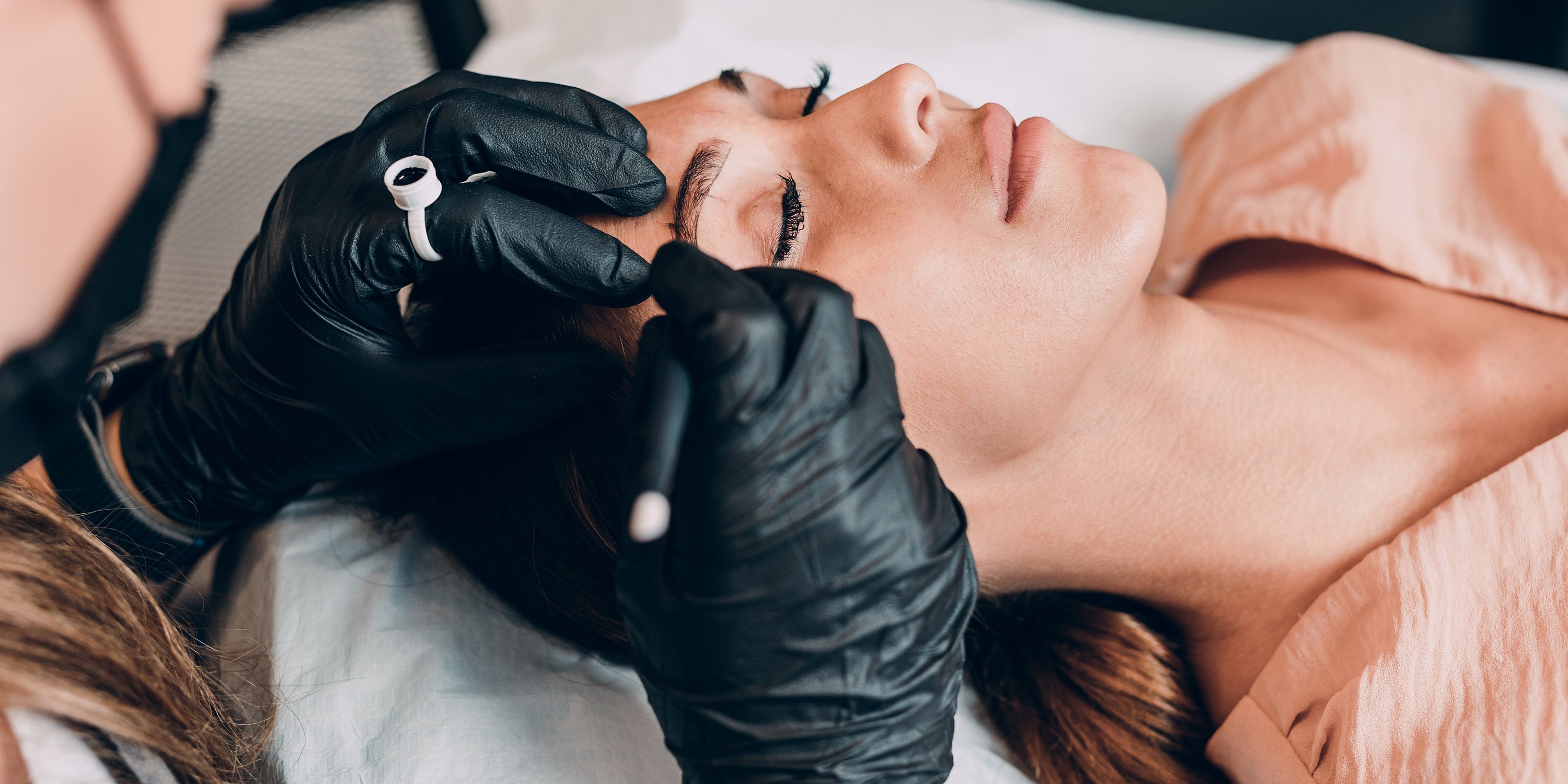 Client having her eyebrows microbladed at Pure Beauty Therapy 