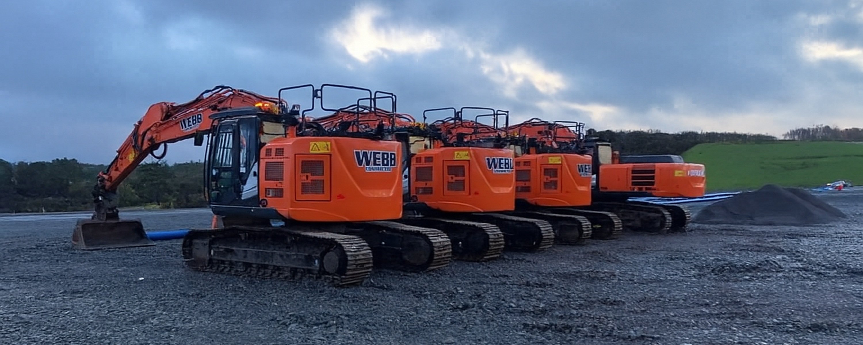 Line up of Webb Contracting diggers