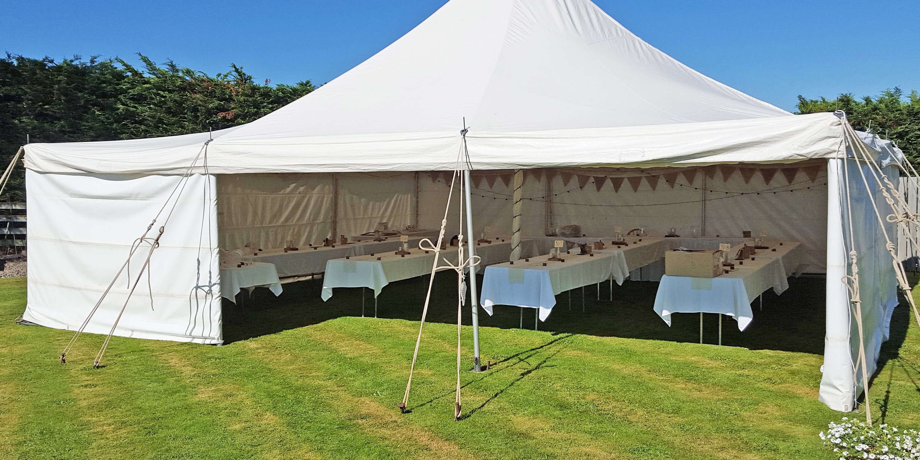 9x9m Electron Marquee Tent with 4 rows of long tables set up inside | Levin Party Hire