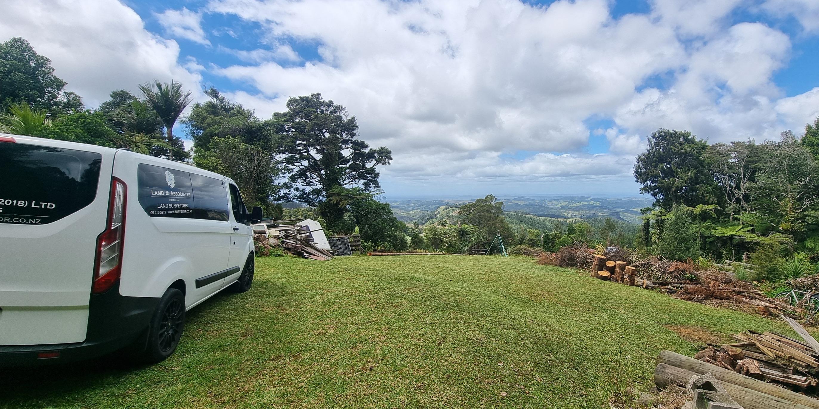 surveying equipment and van