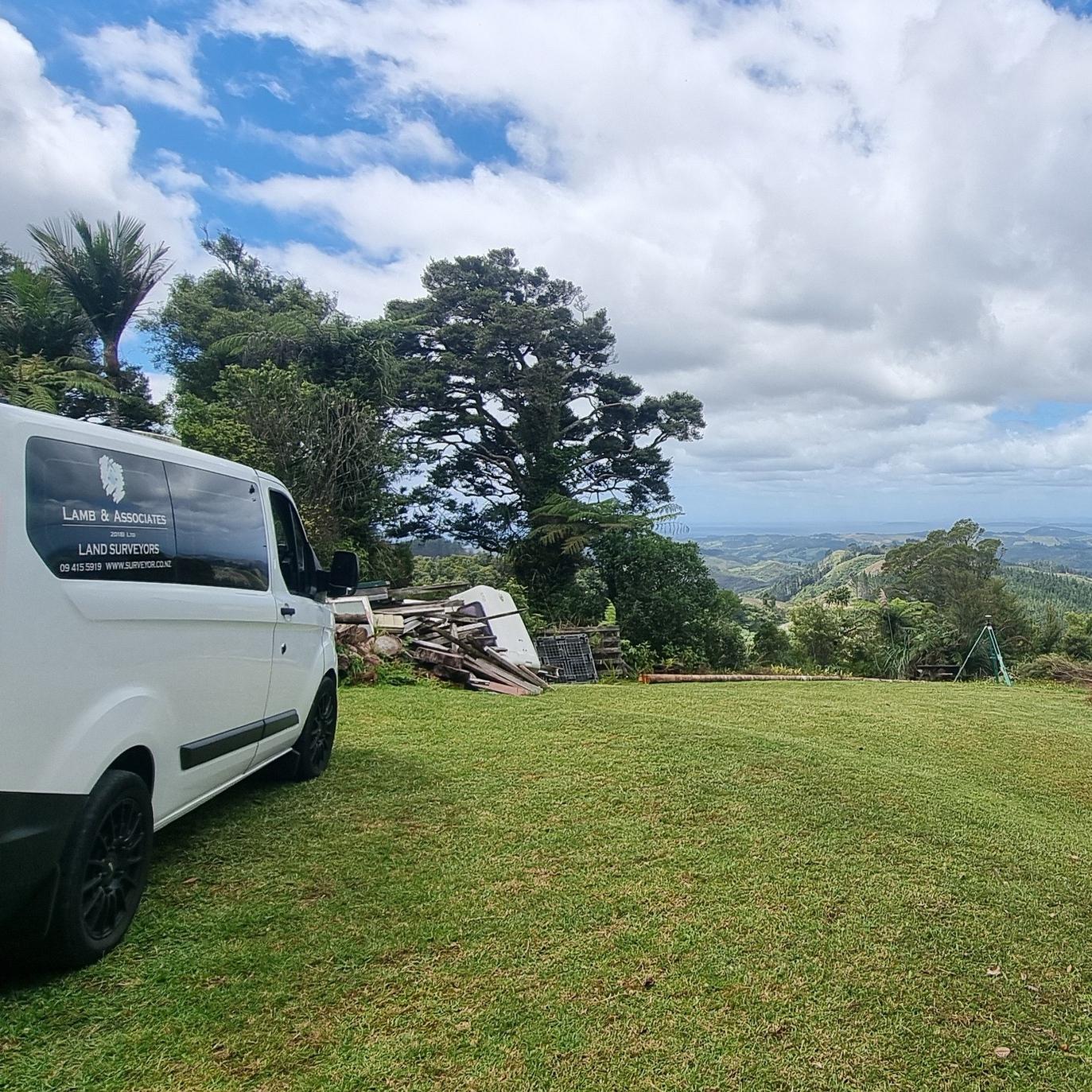 surveying equipment and van