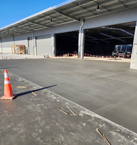 concrete parking pads, factory floors, footpaths and farming feeding slabs by Cook Concrete