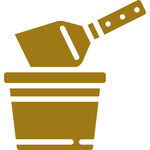 Golden spackle tool in a bucket 