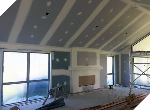 Interior plastering in progress in a house
