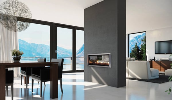 Modern white living room interior and a prominent black double sided inbuilt gas fire in the center