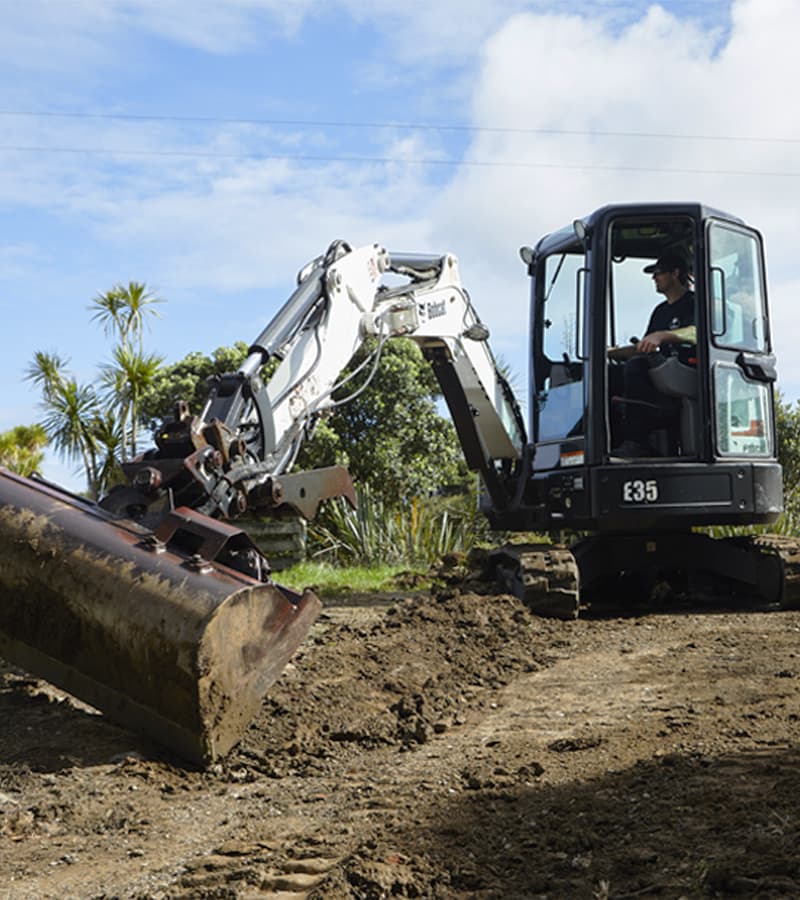 NZ Tiny Home Movers digger going to work on some dirt to prepare a site for a tiny home